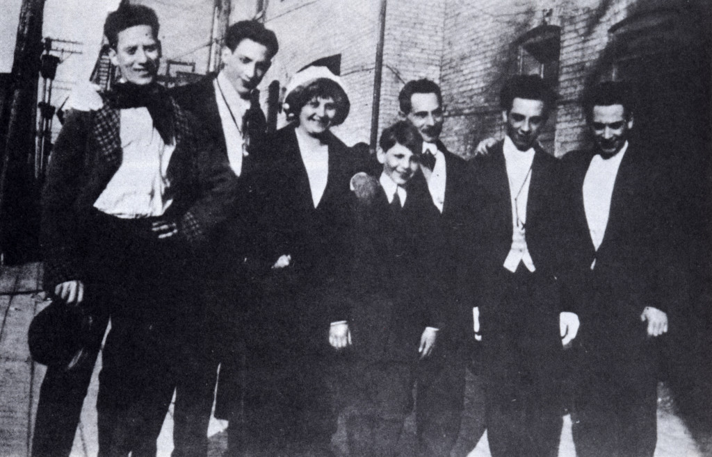 The only known photo of the entire Marx family, c. 1915. From left: Groucho, Gummo, Minnie (mother), Zeppo, Sam (father), Chico, and Harpo.