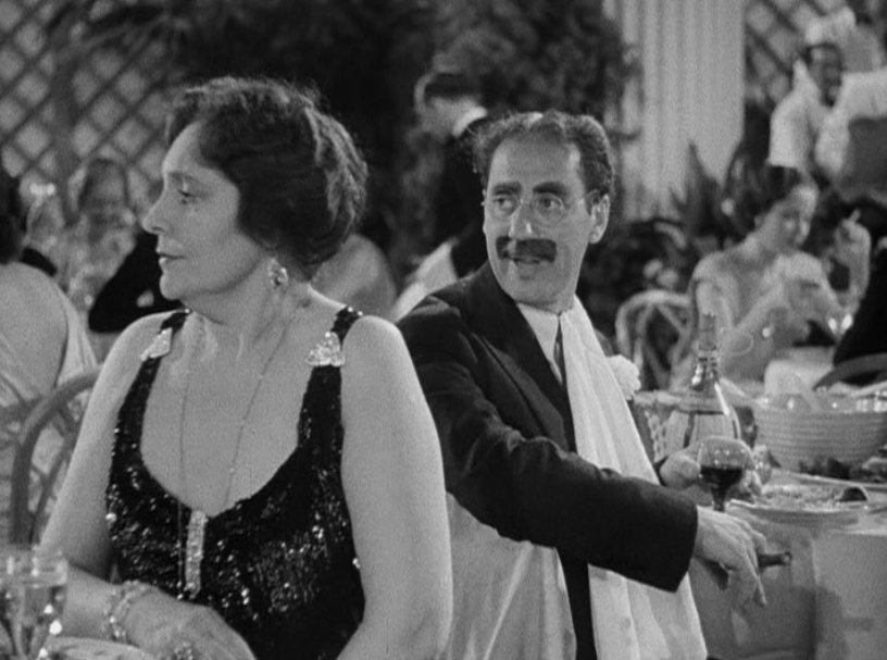 Margaret Dumont and Groucho Marx, perform the requisite amount of sparring. 